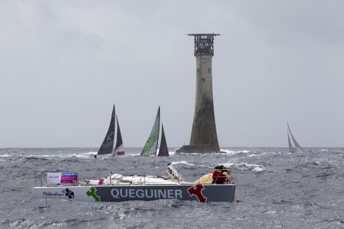 Dematage de Yann Elies (Groupe Queguiner)  au passage du phare de Wolf Rock lors de la 1ere etape de la Solitaire du Figaro Eric Bompard Cachemire 2014 entre Deauville et Plymouth - le 10/06/2014