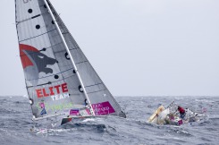 Dematage de Yann Elies (Groupe Queguiner)  au passage du phare de Wolf Rock lors de la 1ere etape de la Solitaire du Figaro Eric Bompard Cachemire 2014 entre Deauville et Plymouth - le 10/06/2014